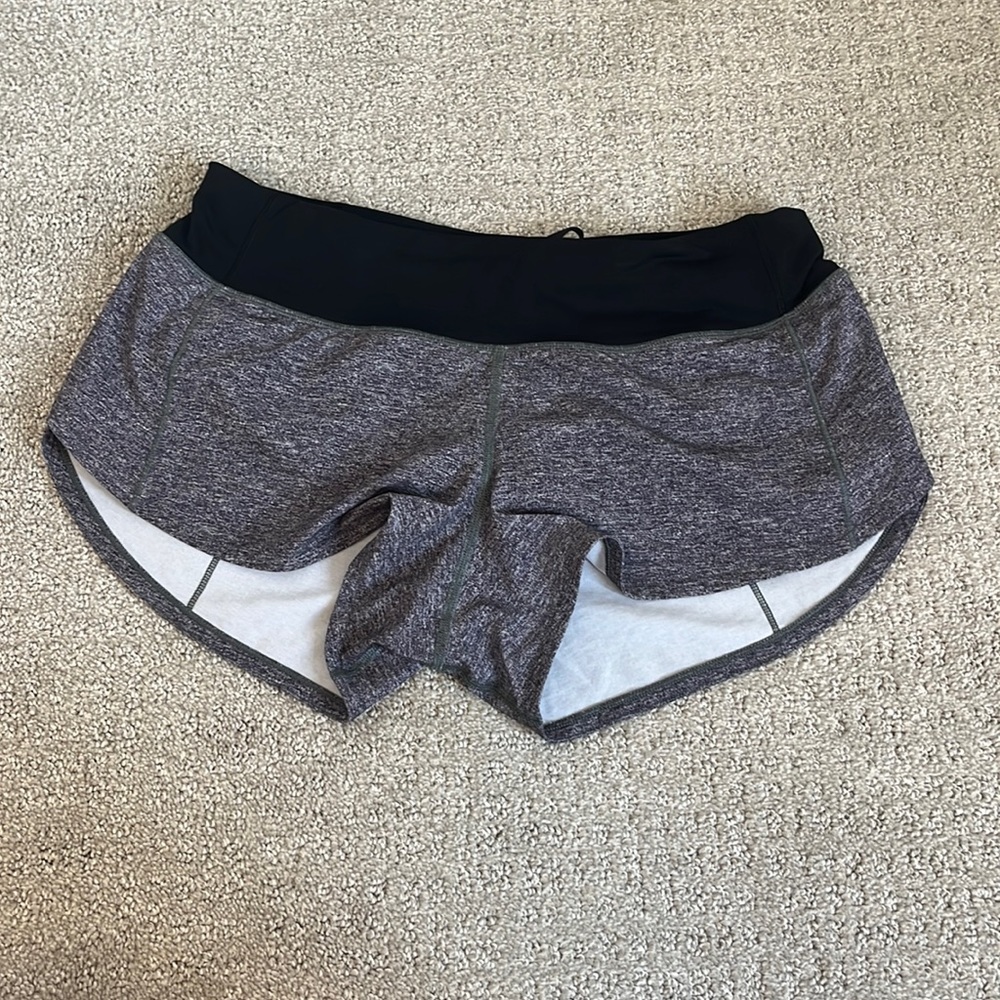 LULULEMON SPEED UP SHORTS (GREY). SIZE: 4. WORN ONCE.